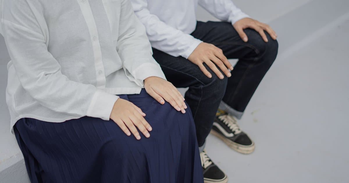 Men's and Women's Shirts Button on Opposite Sides on Purpose